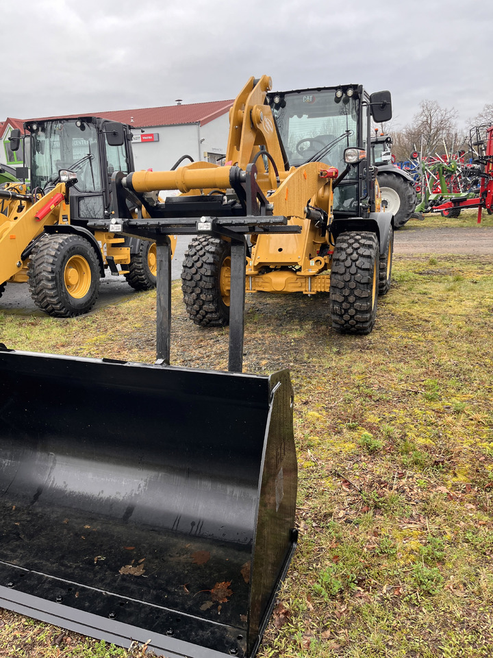 Caterpillar 908 HL - Chargeuse sur pneus: photos 1 Caterpillar 908 HL - Chargeuse sur pneus: photos 1