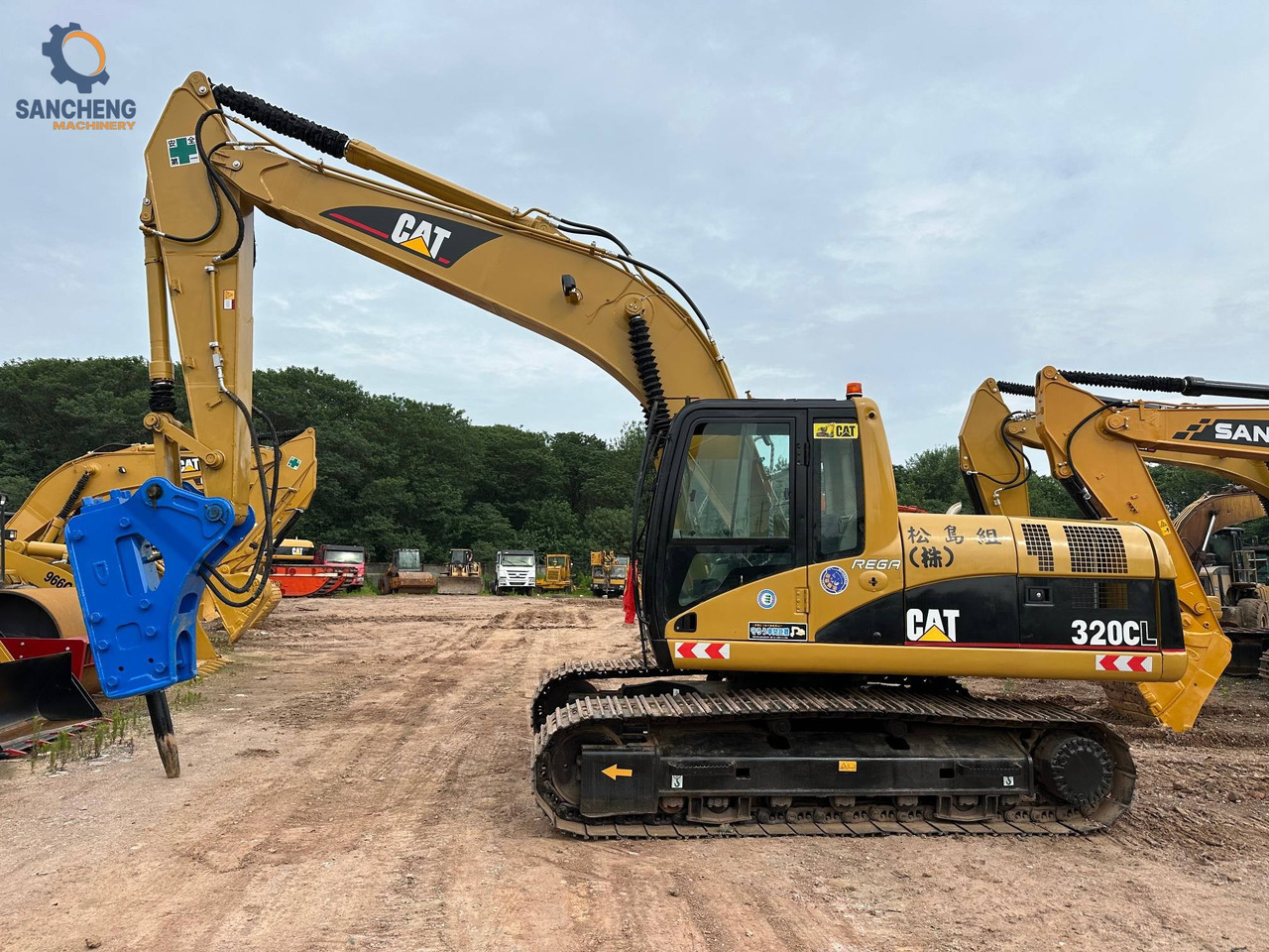 CAT 320CL with hammer - Pelle sur chenille: photos 3 CAT 320CL with hammer - Pelle sur chenille: photos 3