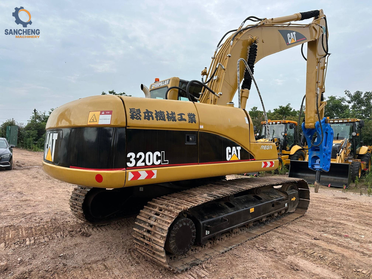 CAT 320CL with hammer - Pelle sur chenille: photos 2 CAT 320CL with hammer - Pelle sur chenille: photos 2