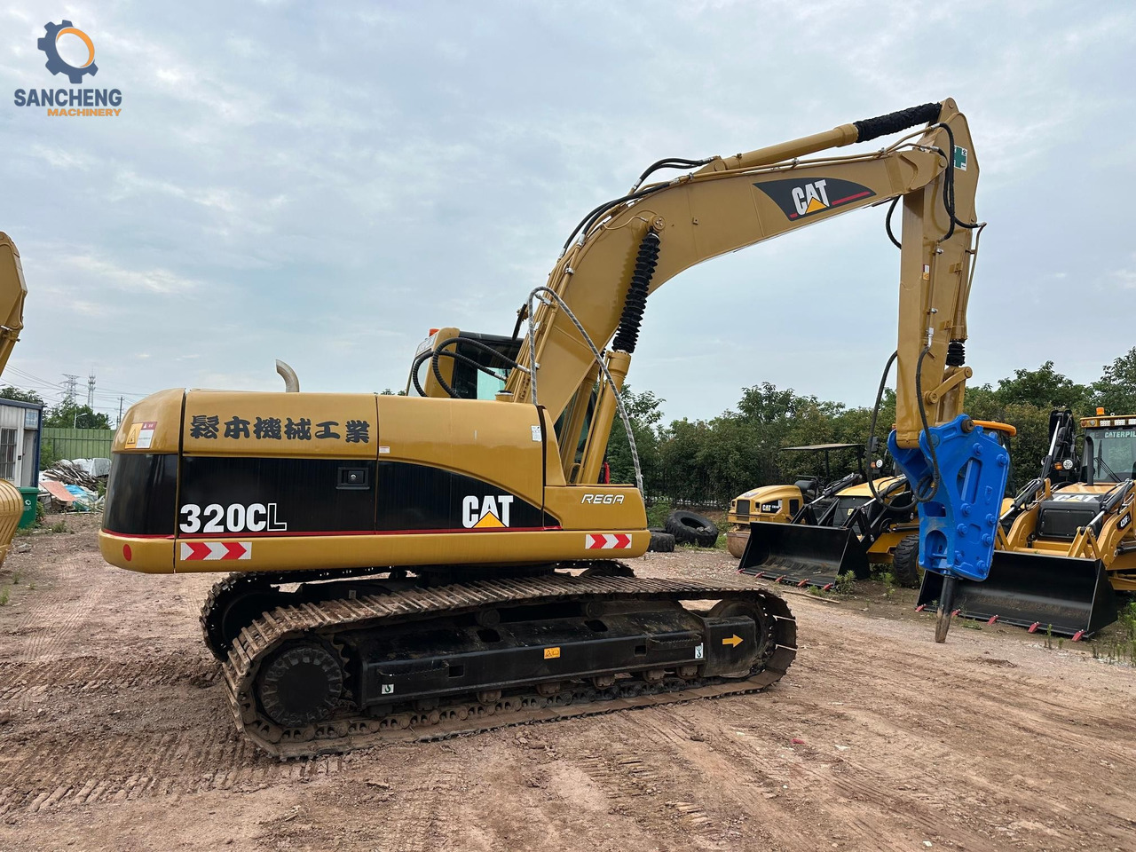CAT 320CL with hammer - Pelle sur chenille: photos 3 CAT 320CL with hammer - Pelle sur chenille: photos 3