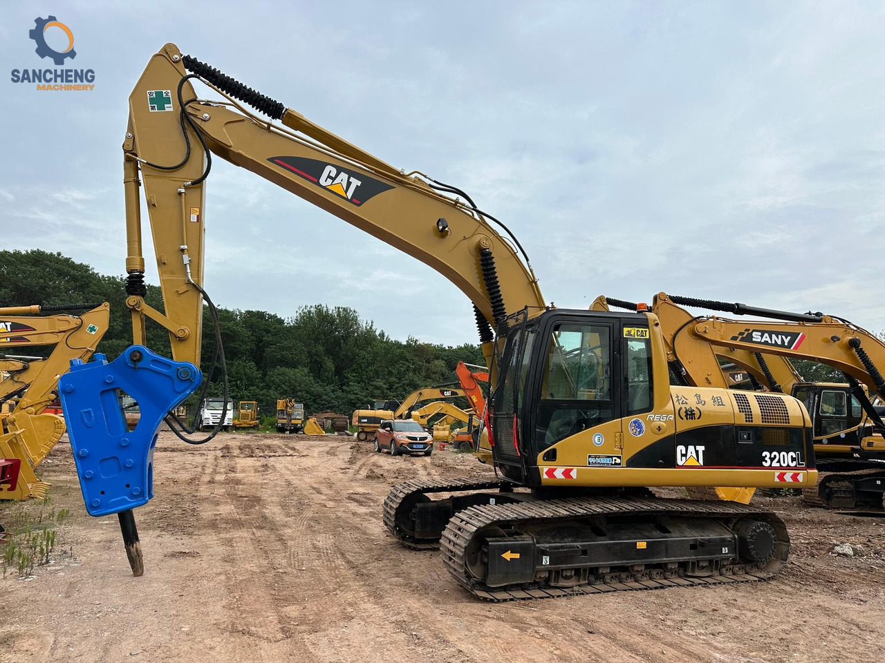 CAT 320CL with hammer crawler excavator - Pelle sur chenille: photos 1 CAT 320CL with hammer crawler excavator - Pelle sur chenille: photos 1
