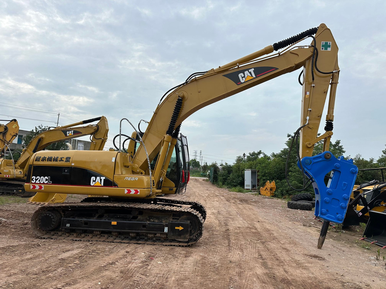 CATERPILLAR 320CL - Pelle sur chenille: photos 1 CATERPILLAR 320CL - Pelle sur chenille: photos 1