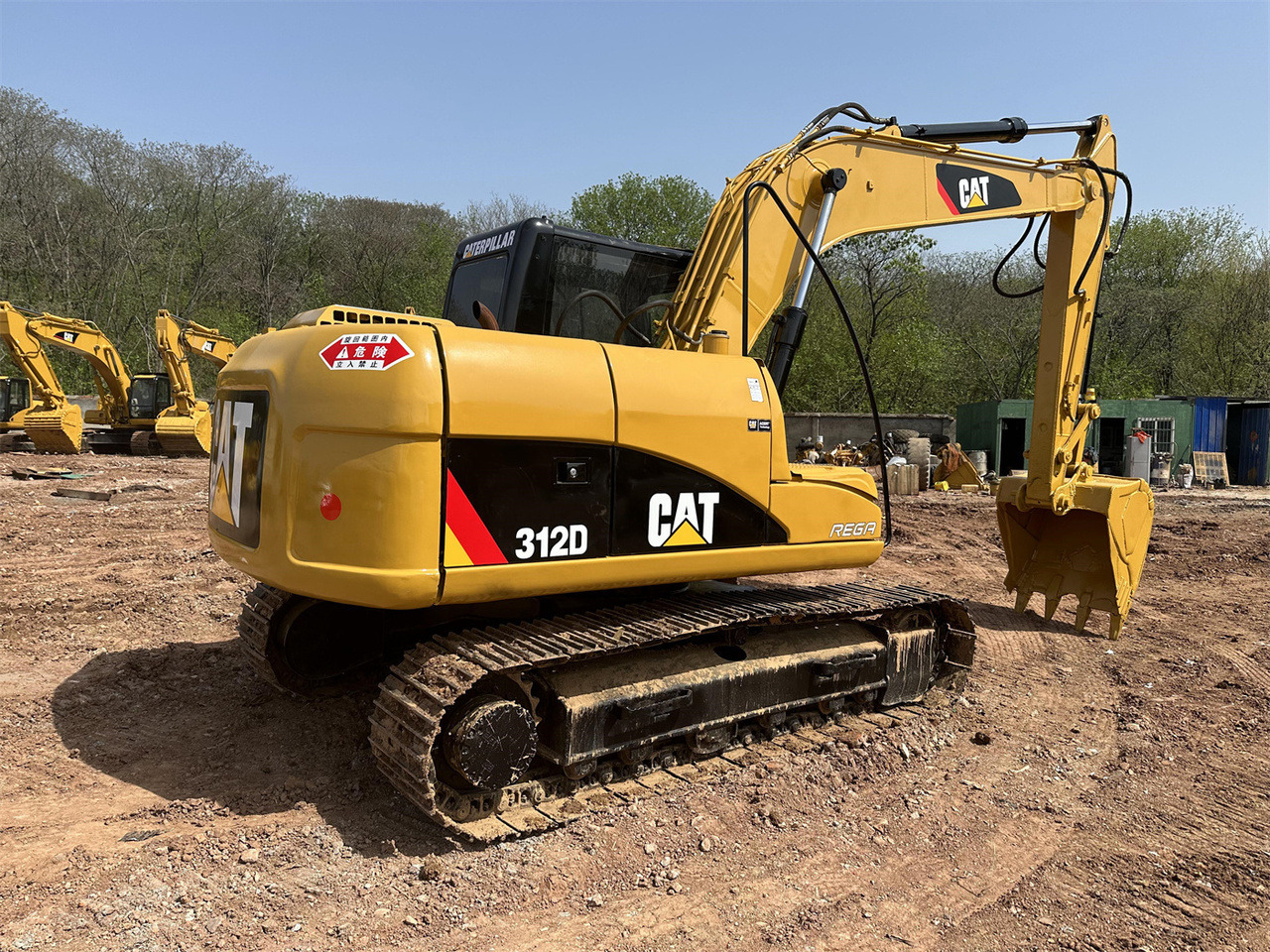 Caterpillar 312D - Mini pelle: photos 1 Caterpillar 312D - Mini pelle: photos 1