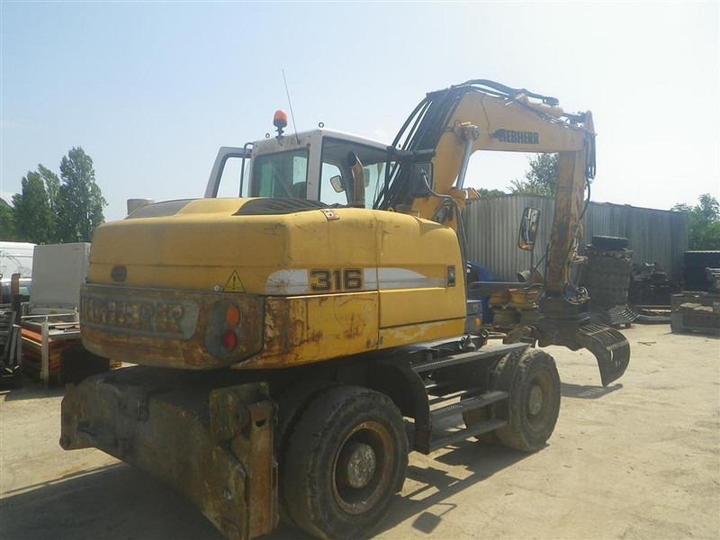 Liebherr A316Li - Pelle: photos 1 Liebherr A316Li - Pelle: photos 1