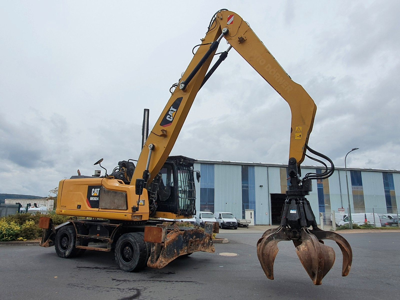 Pelle sur pneus CAT MH3024 / MH 3024 / Greifer / 2018 / 9.424h: photos 8
