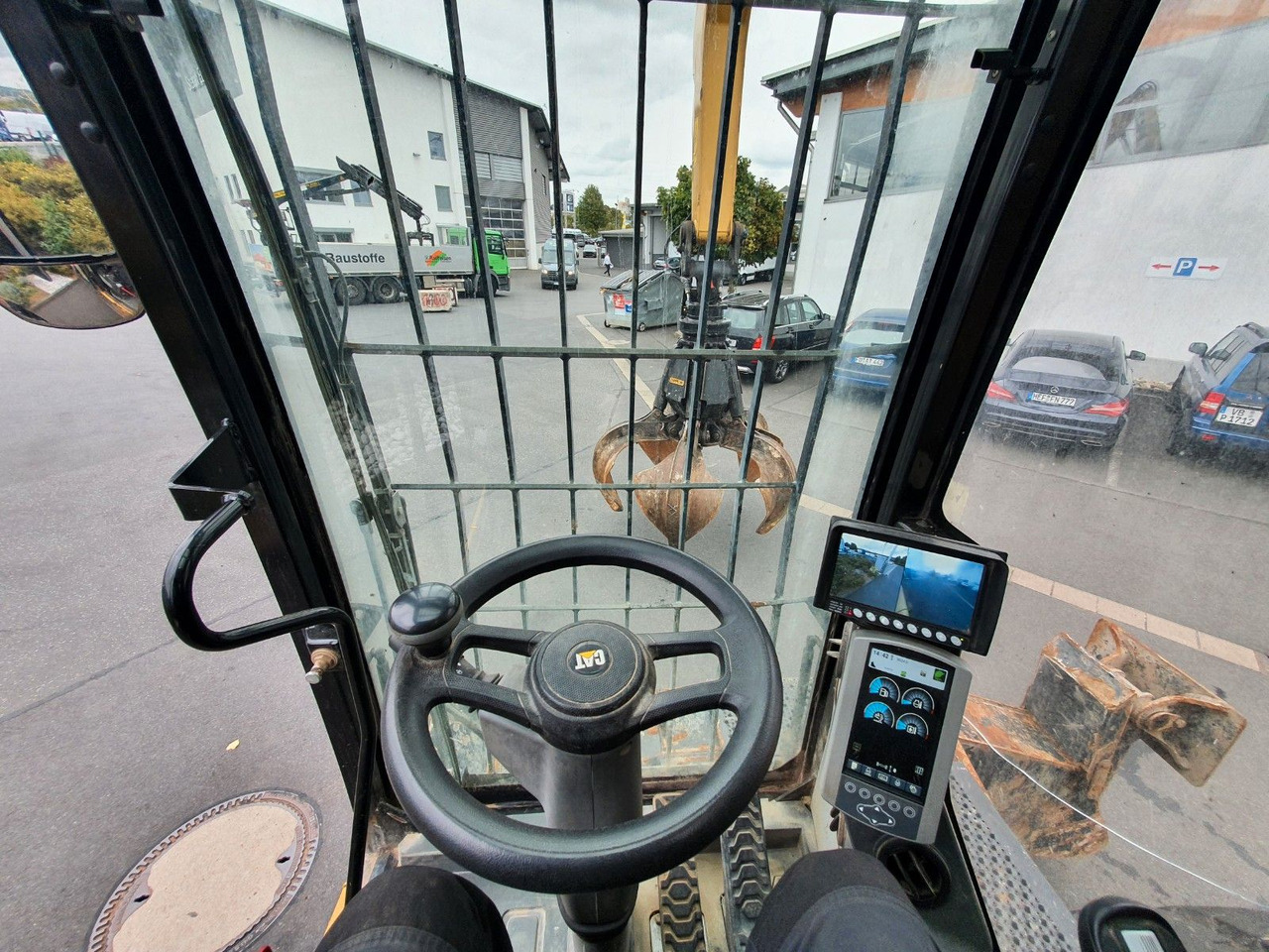 Pelle sur pneus CAT MH3024 / MH 3024 / Greifer / 2018 / 9.424h: photos 11