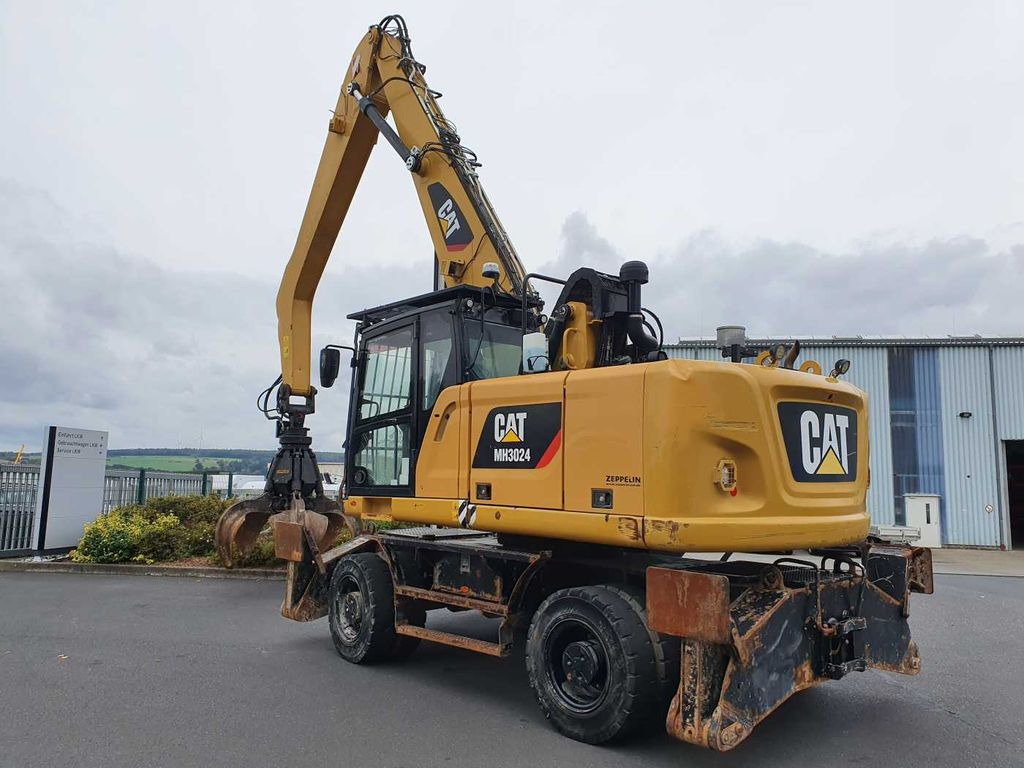 CAT MH3024 / MH 3024 / inkl. Greifer / 2018 / 9.424h - Pelle sur pneus: photos 5 CAT MH3024 / MH 3024 / inkl. Greifer / 2018 / 9.424h - Pelle sur pneus: photos 5