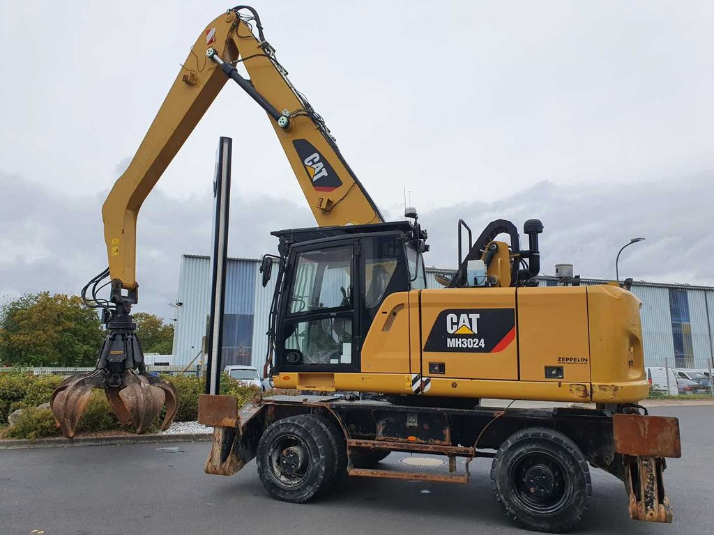 CAT MH3024 / MH 3024 / inkl. Greifer / 2018 / 9.424h - Pelle sur pneus: photos 4 CAT MH3024 / MH 3024 / inkl. Greifer / 2018 / 9.424h - Pelle sur pneus: photos 4