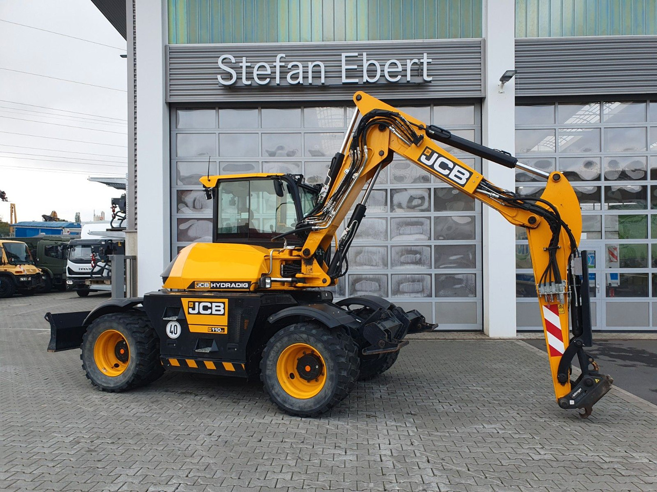 JCB Hydradig 110W / Pratzen / nur 572h! / 2023 - Pelle sur pneus: photos 1 JCB Hydradig 110W / Pratzen / nur 572h! / 2023 - Pelle sur pneus: photos 1