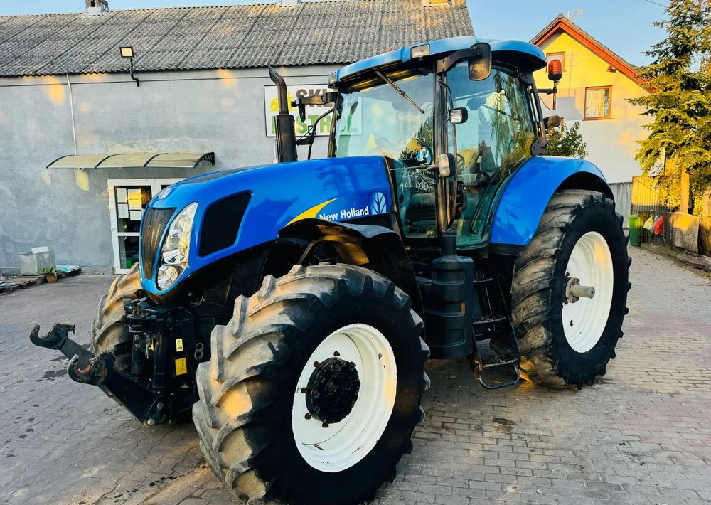 New Holland T7030 - Tracteur agricole: photos 1 New Holland T7030 - Tracteur agricole: photos 1