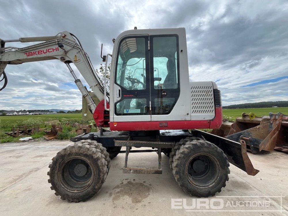 2011 Takeuchi TB175W - Pelle sur pneus: photos 1 2011 Takeuchi TB175W - Pelle sur pneus: photos 1
