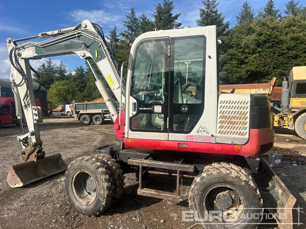 2012 Takeuchi TB175W - Pelle sur pneus: photos 1 2012 Takeuchi TB175W - Pelle sur pneus: photos 1