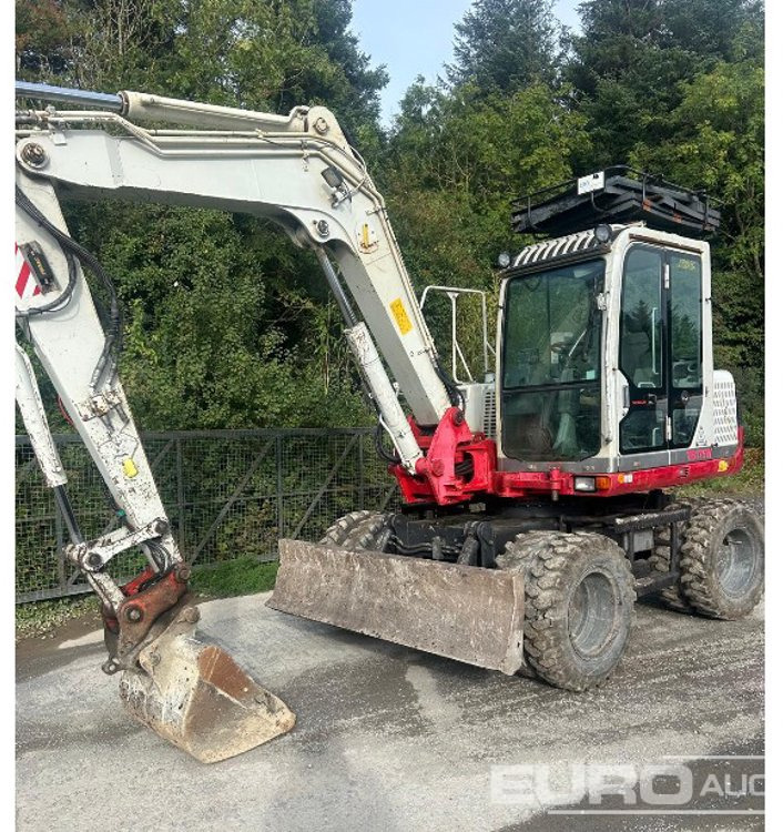 2012 Takeuchi TB175W - Pelle sur pneus: photos 1 2012 Takeuchi TB175W - Pelle sur pneus: photos 1