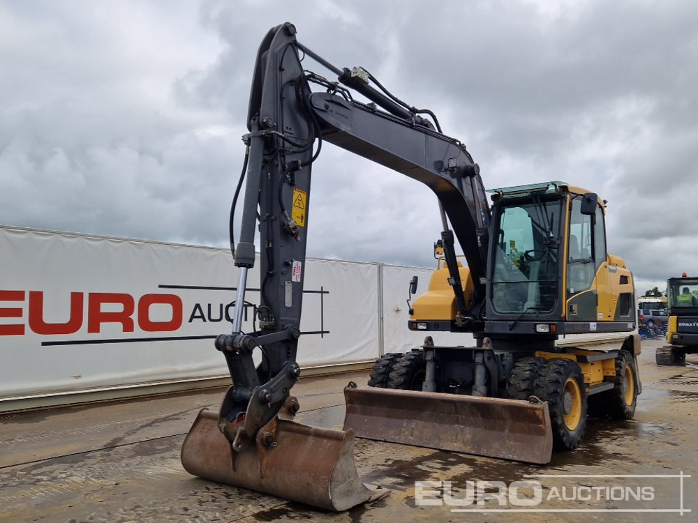 2014 Volvo EW140D - Pelle sur pneus: photos 1 2014 Volvo EW140D - Pelle sur pneus: photos 1