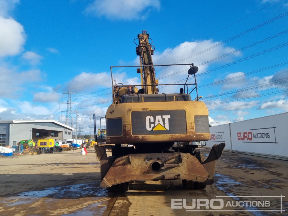 CAT M325D MH - Pelle sur pneus: photos 4 CAT M325D MH - Pelle sur pneus: photos 4