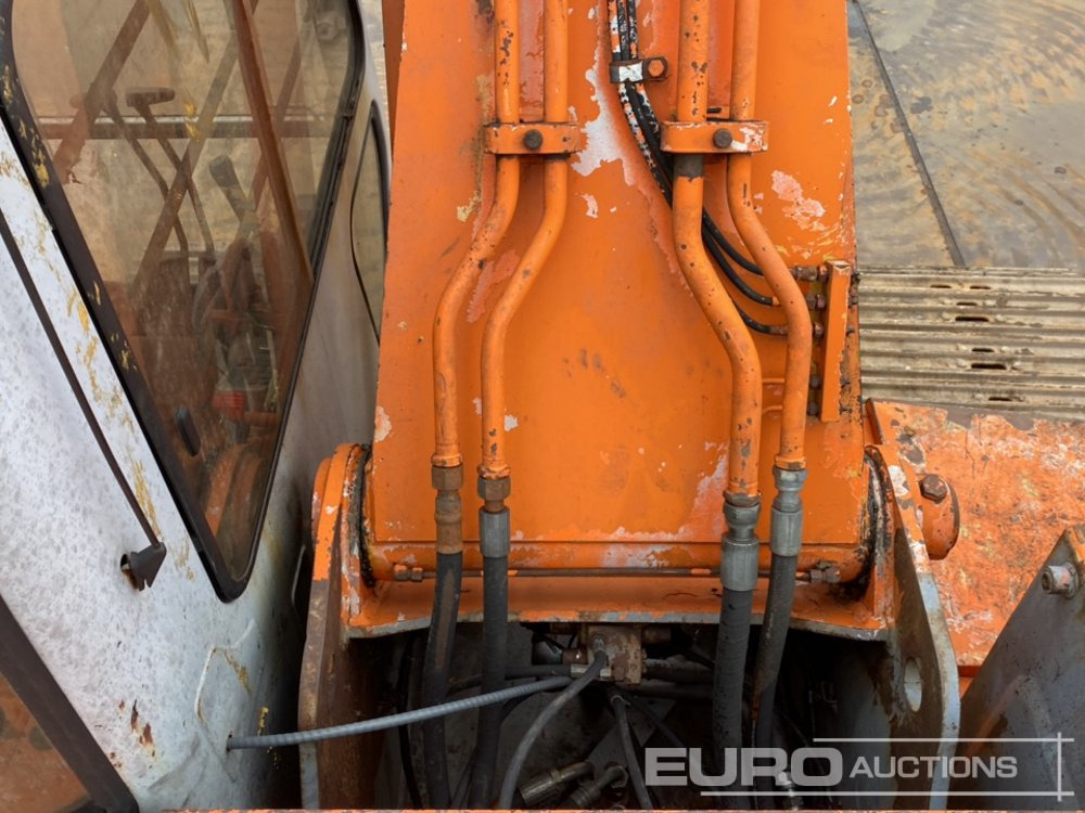 Pelle sur chenille Hitachi EX200: photos 25