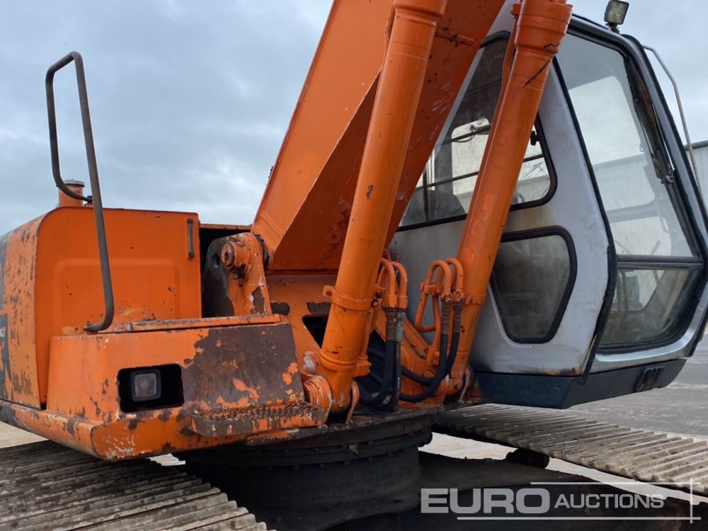Pelle sur chenille Hitachi EX200: photos 24