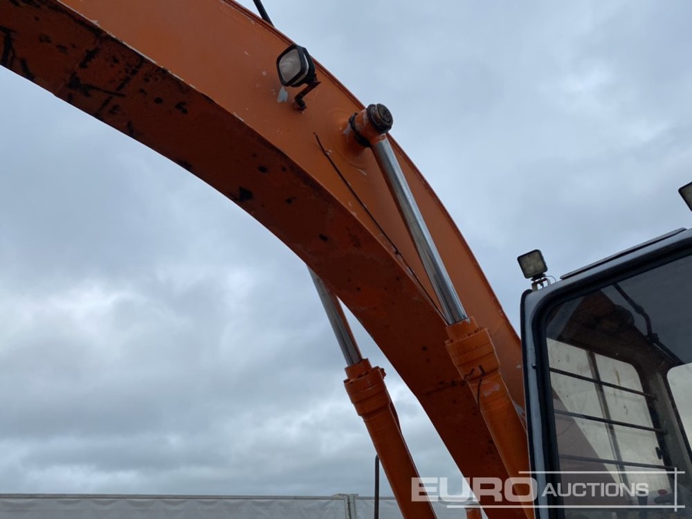 Pelle sur chenille Hitachi EX200: photos 17