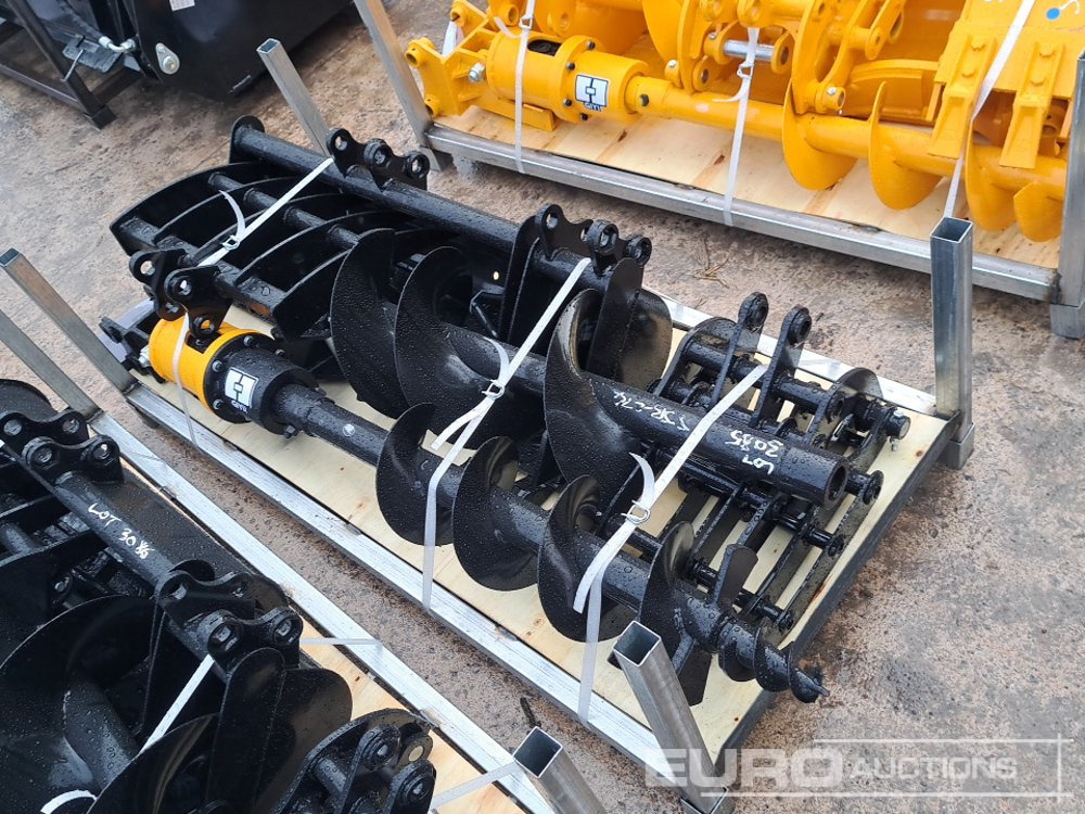 Unused Rake, Ripper, Grabber,12” Auger, 8” Auger, 8” Narrow Bucket, 30” Bucket, QH - Godet: photos 1 Unused Rake, Ripper, Grabber,12” Auger, 8” Auger, 8” Narrow Bucket, 30” Bucket, QH - Godet: photos 1