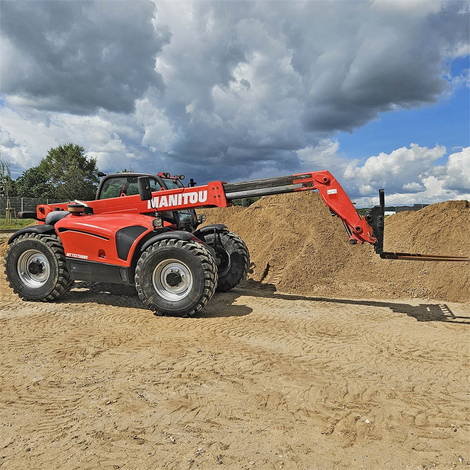 Manitou MT732 100 D - Chariot télescopique: photos 1 Manitou MT732 100 D - Chariot télescopique: photos 1