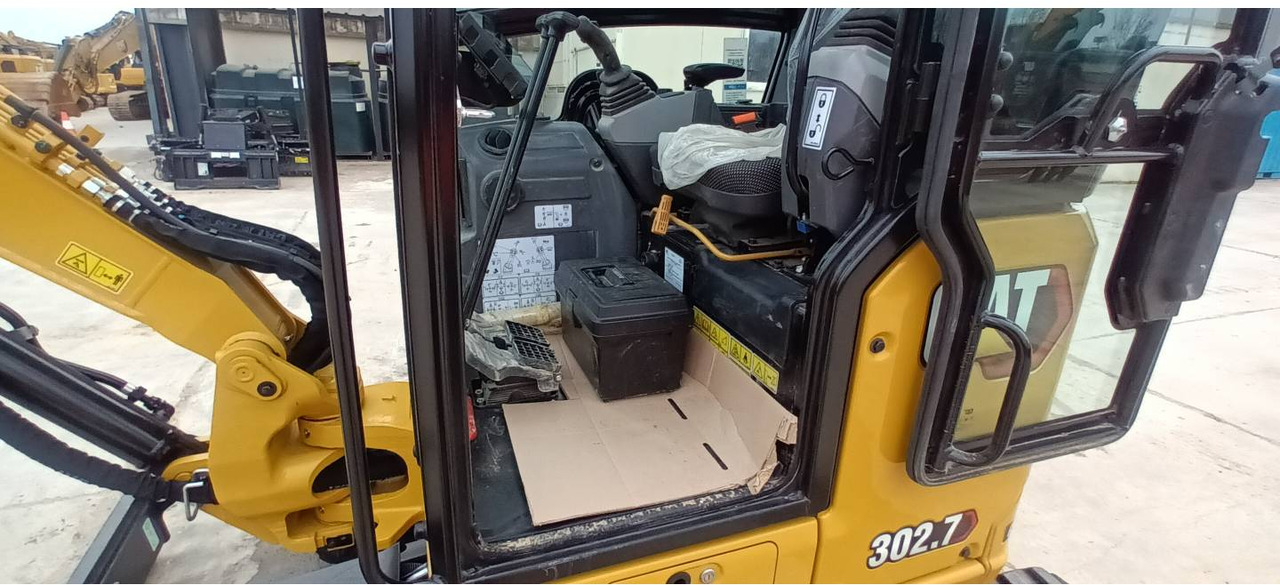 Pelle sur chenille CAT 302.7: photos 13