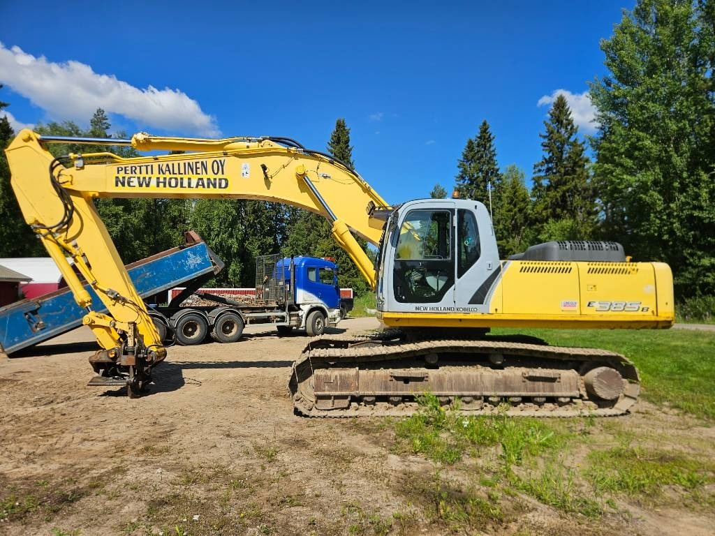 New Holland E 385 B - Pelle sur chenille: photos 1 New Holland E 385 B - Pelle sur chenille: photos 1