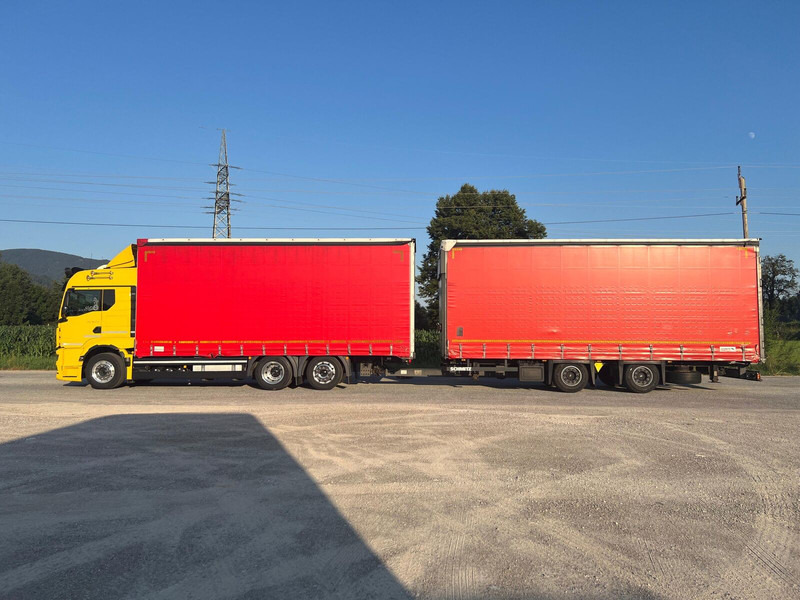 MAN TGS 26.510 6X2-4LL + SCHMITZ 120m3 - Camion à rideaux coulissants: photos 4 MAN TGS 26.510 6X2-4LL + SCHMITZ 120m3 - Camion à rideaux coulissants: photos 4