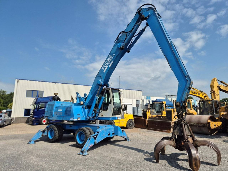 Fuchs MHL331 - Pelle sur pneus: photos 4 Fuchs MHL331 - Pelle sur pneus: photos 4