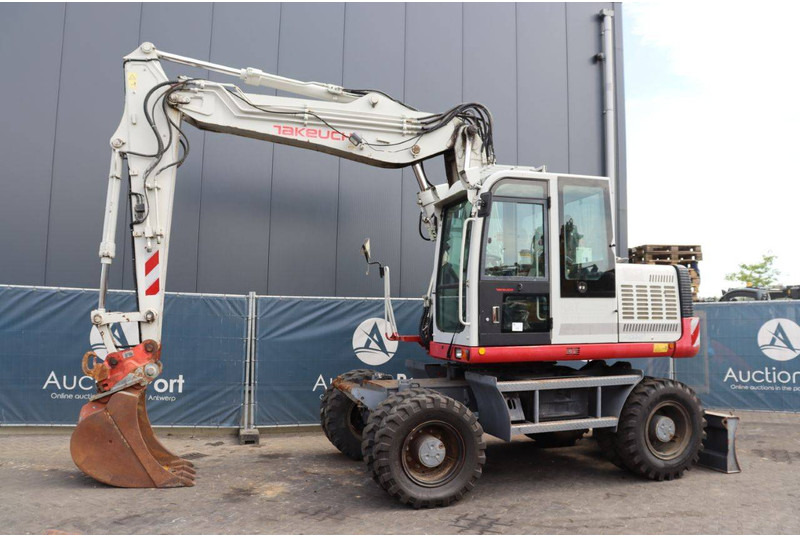 Takeuchi TB1160W - Pelle sur pneus: photos 1 Takeuchi TB1160W - Pelle sur pneus: photos 1