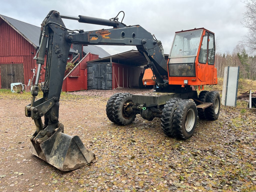 Atlas 1202 - Pelle sur pneus: photos 1 Atlas 1202 - Pelle sur pneus: photos 1