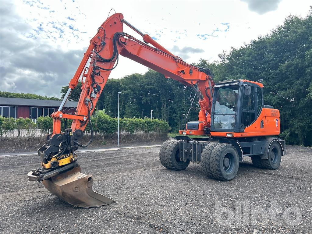 Doosan DX160W - Pelle sur pneus: photos 2 Doosan DX160W - Pelle sur pneus: photos 2