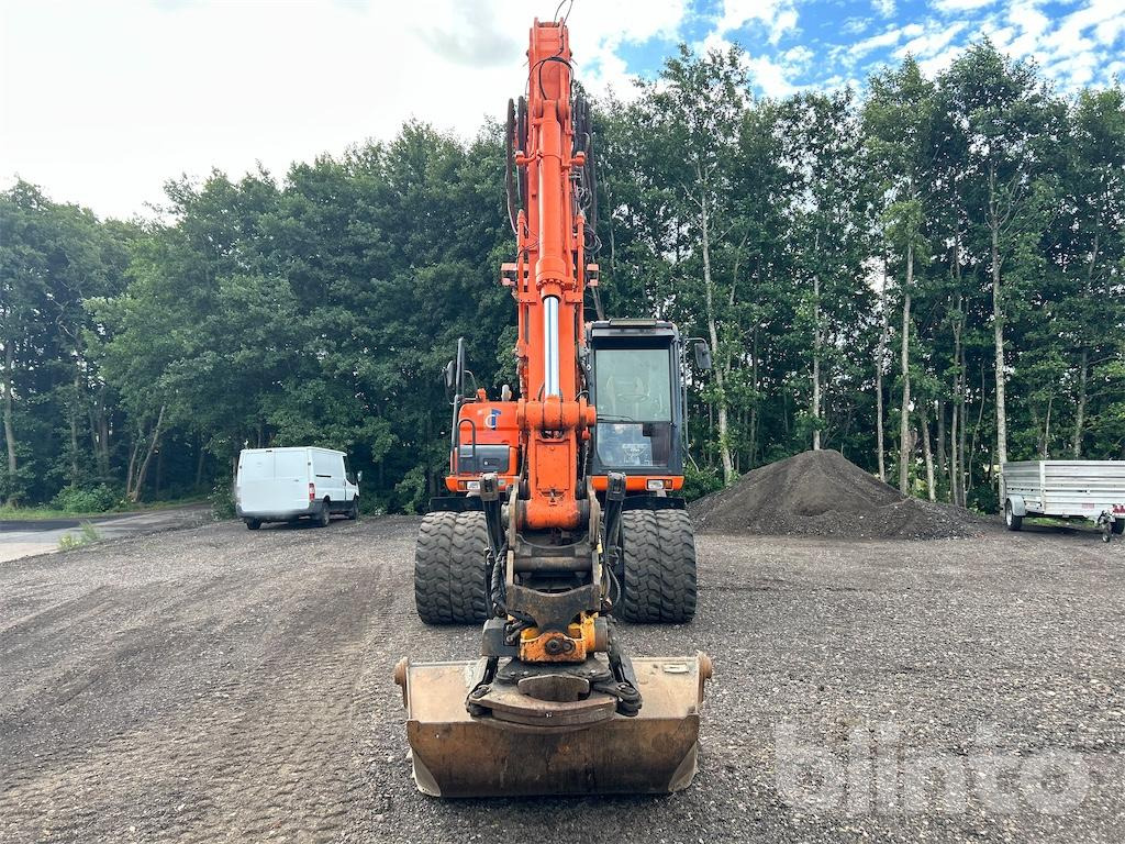 Doosan DX160W - Pelle sur pneus: photos 3 Doosan DX160W - Pelle sur pneus: photos 3