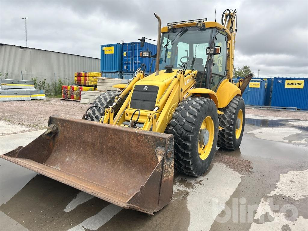 New Holland LB115 4WD - Tractopelle: photos 1 New Holland LB115 4WD - Tractopelle: photos 1