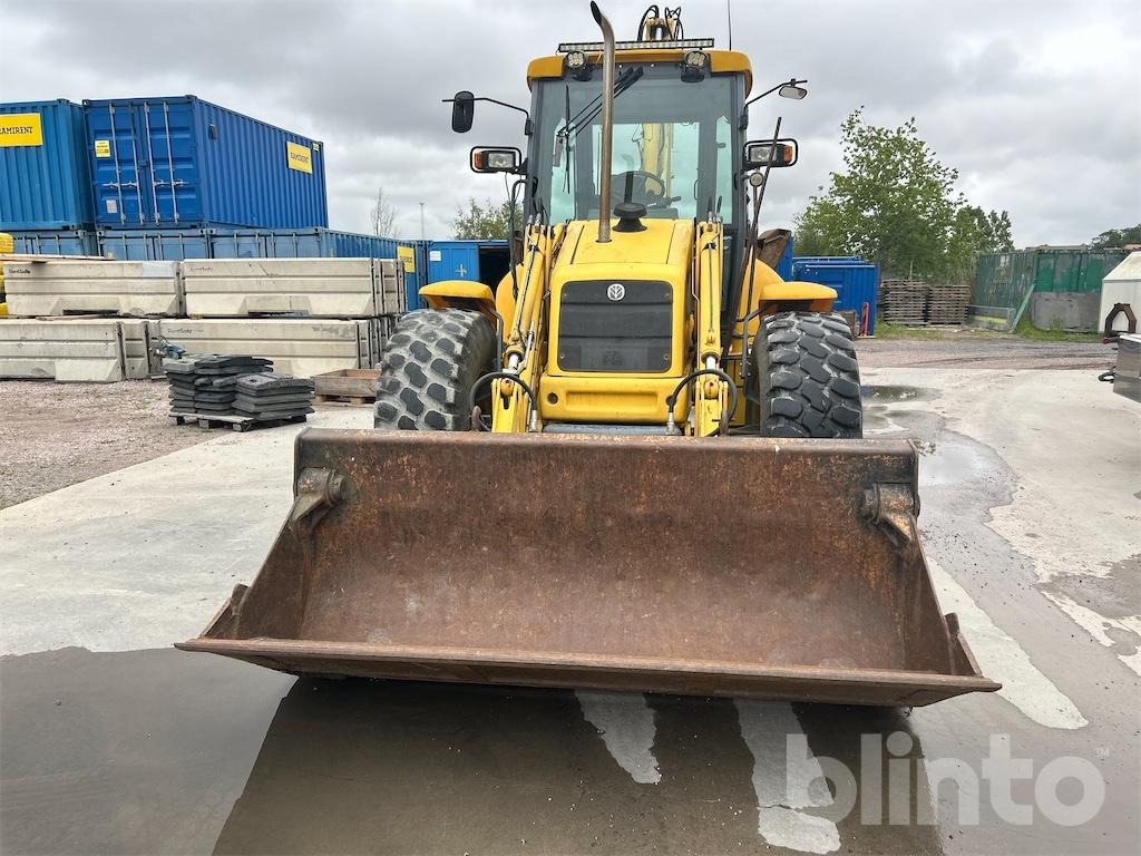 New Holland LB115 4WD - Tractopelle: photos 2 New Holland LB115 4WD - Tractopelle: photos 2
