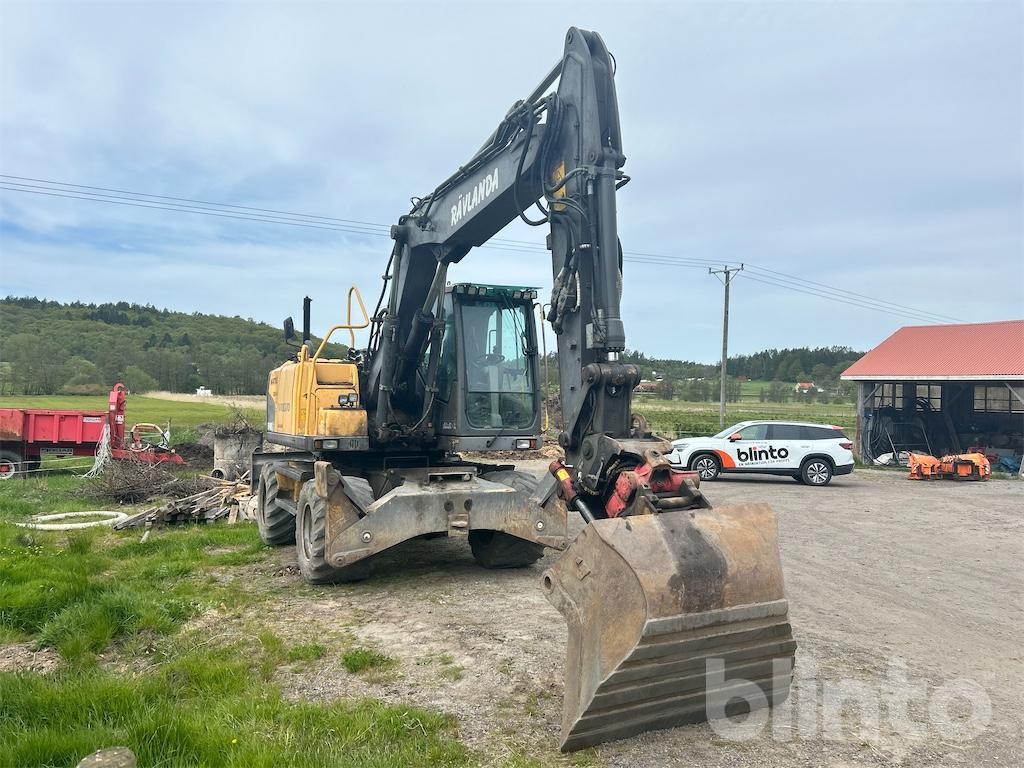 Volvo EW140 - Pelle sur pneus: photos 2 Volvo EW140 - Pelle sur pneus: photos 2