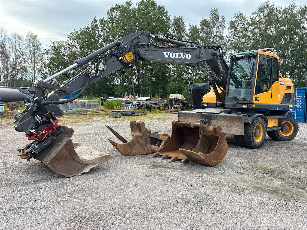 Volvo EW140D - Pelle sur pneus: photos 1 Volvo EW140D - Pelle sur pneus: photos 1