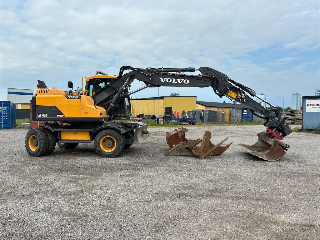 Volvo EW140D - Pelle sur pneus: photos 4 Volvo EW140D - Pelle sur pneus: photos 4
