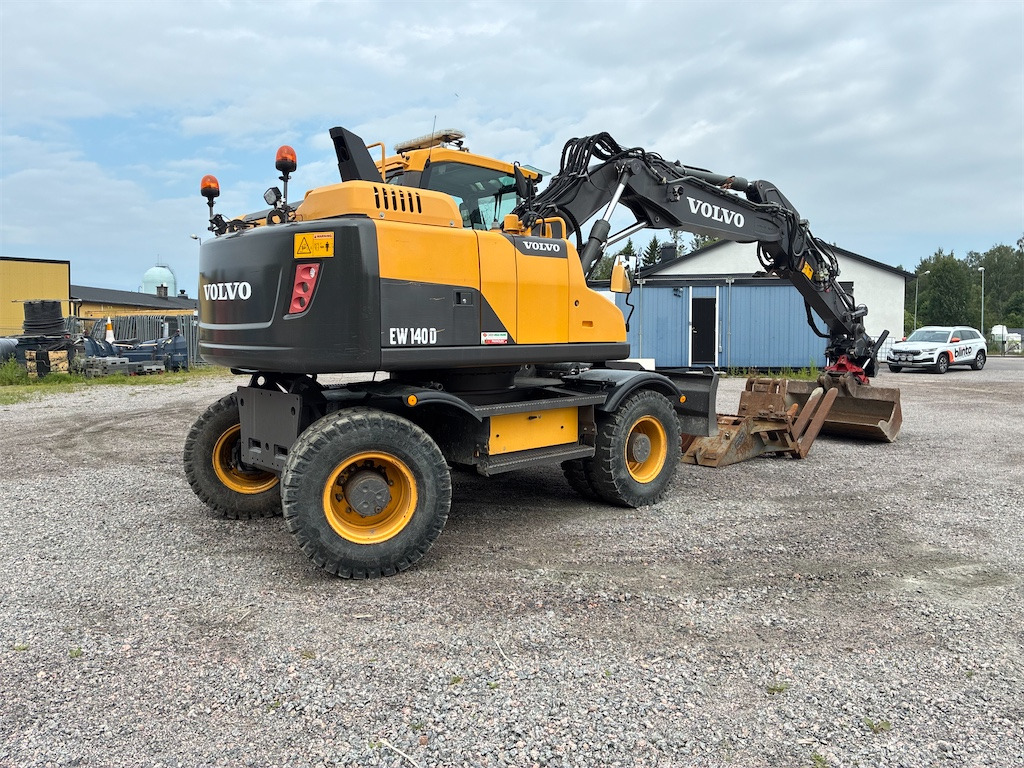 Volvo EW140D - Pelle sur pneus: photos 5 Volvo EW140D - Pelle sur pneus: photos 5