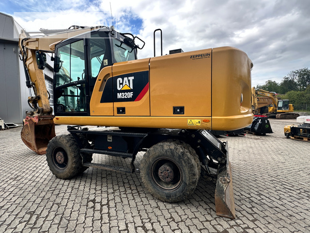 Cat M320F - Pelle sur pneus: photos 2 Cat M320F - Pelle sur pneus: photos 2