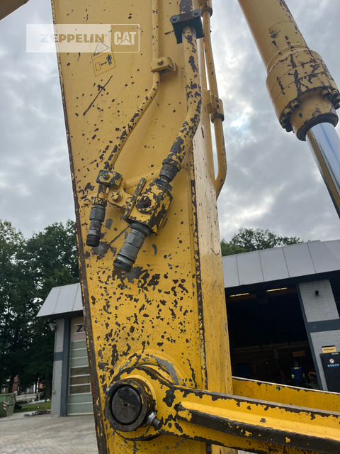 Pelle sur chenille New Holland E235: photos 12